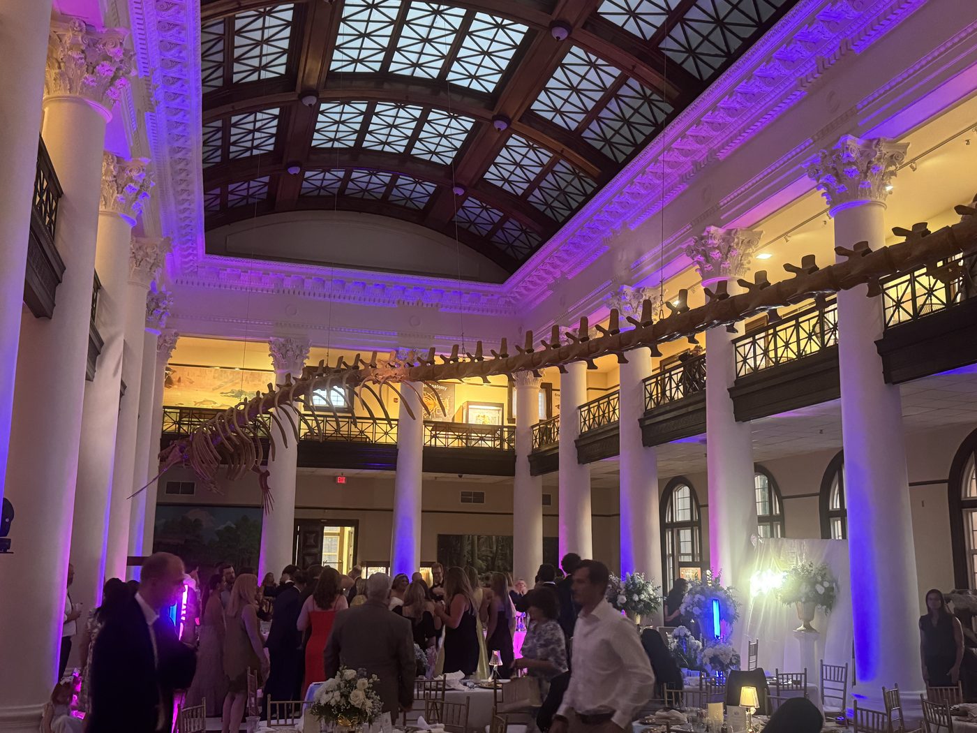 Wedding reception at a museum venue with uplighting